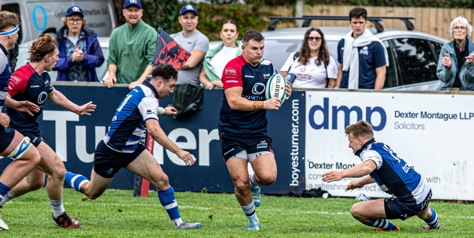 Morgan MacRae playing rugby