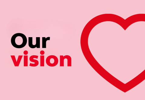 A large graphic of a heart, with text that says 'Our vision'