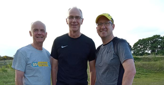 Image of Tony with running buddies who saved his life 