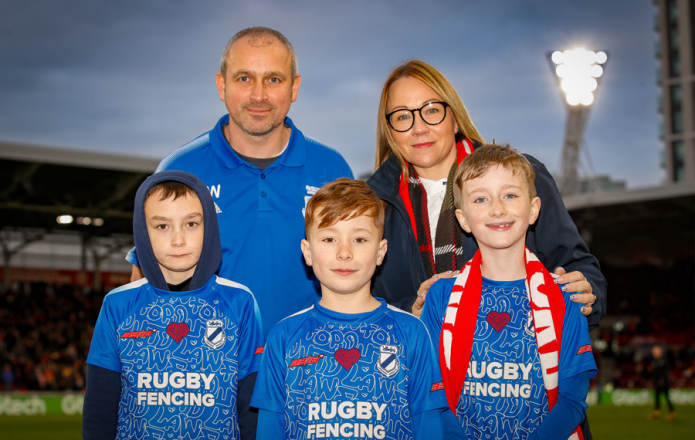 Rugby community football team wear CPQR code on their kit